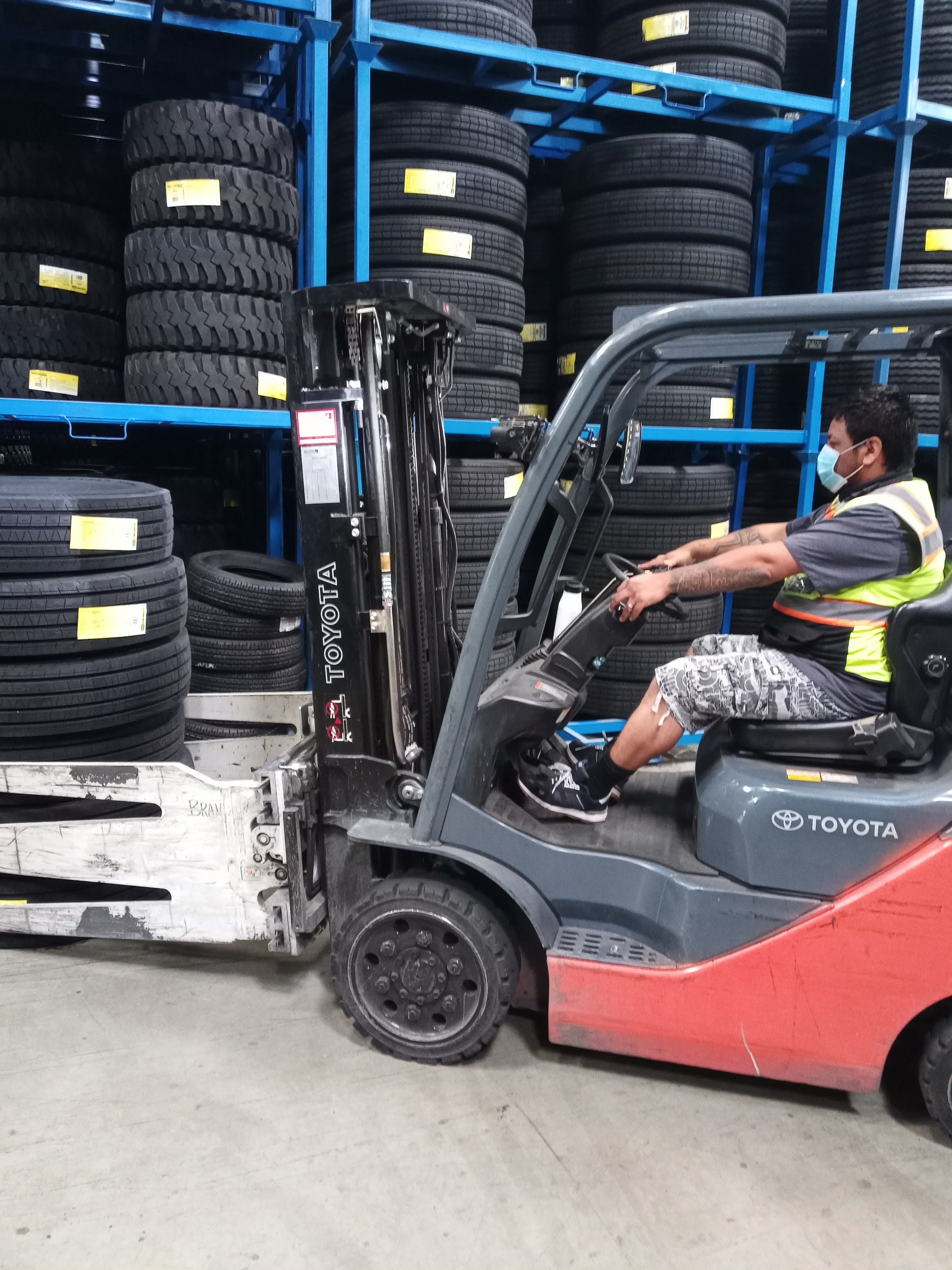 Double Coin warehouse worker on forklift